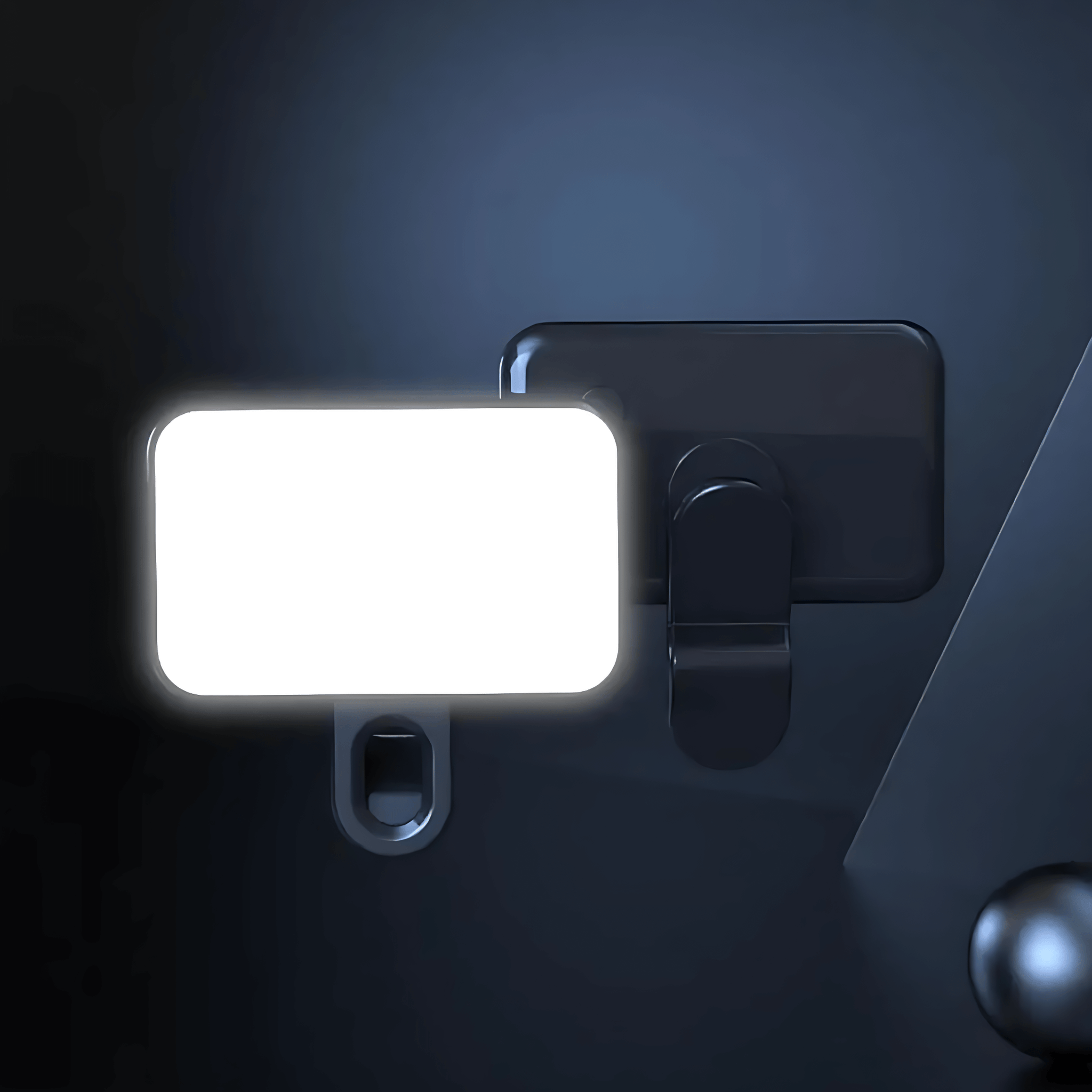 Pocket LED Selfie Light – Clip-On Phone & Laptop Fill Light mounted on a dark surface, showcasing bright illumination.